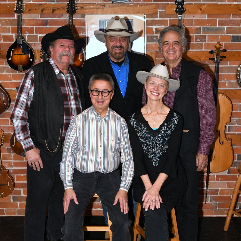 standing:  Johnny Neill, Jon Chandler, Jeff Graves;  seated:  Ernie Martinez, Roz Brown, Bill Barwick;  front:  Kit Simon
