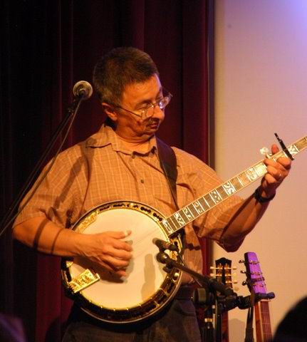 another banjo: Ernie Martinez: Bands,
                          Singers, Songwriters / Composers, Solo
                          Performers, Sidemen, Instrumentalists,
                          Performers, Entertainers, Musicians